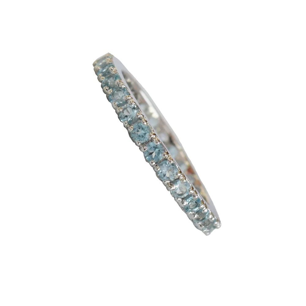 A Symphony of Elegance: Round Blue Topaz Full Eternity 925 Sterling Silver Ring (GSR79)