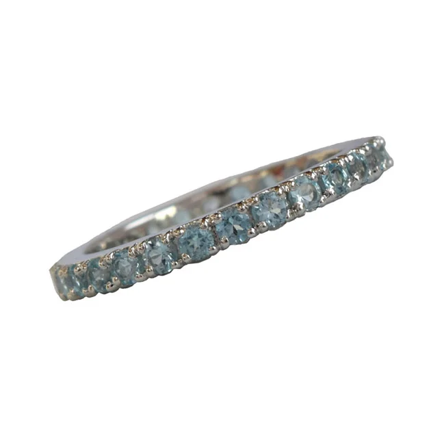 A Symphony of Elegance: Round Blue Topaz Full Eternity 925 Sterling Silver Ring (GSR79)