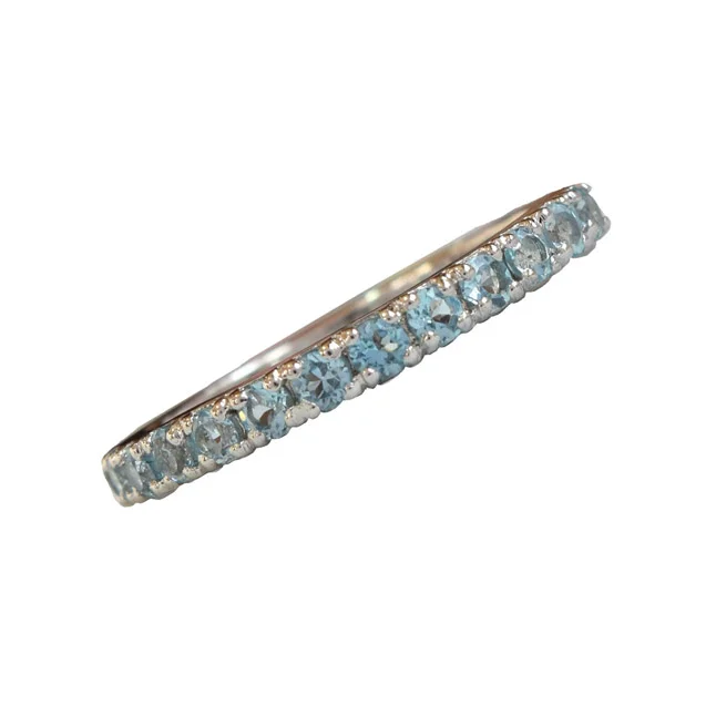 A Wave of Brilliance: Round Blue Topaz Half Eternity 925 Sterling Silver Ring (GSR86)
