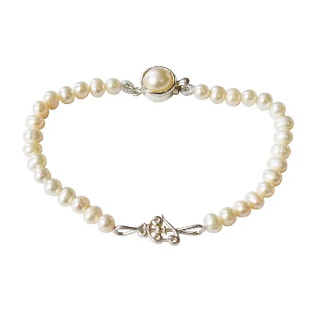 Divine Tranquility: Freshwater Pearl & Silver Om-Trishul Pendant Bracelet for Her (SB83)