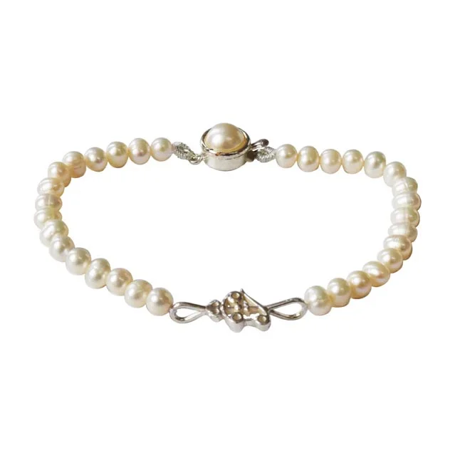 Divine Tranquility: Freshwater Pearl & Silver Om-Trishul Pendant Bracelet for Her (SB83)