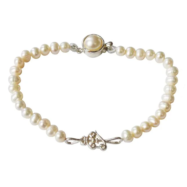 Divine Tranquility: Freshwater Pearl & Silver Om-Trishul Pendant Bracelet for Her (SB83)