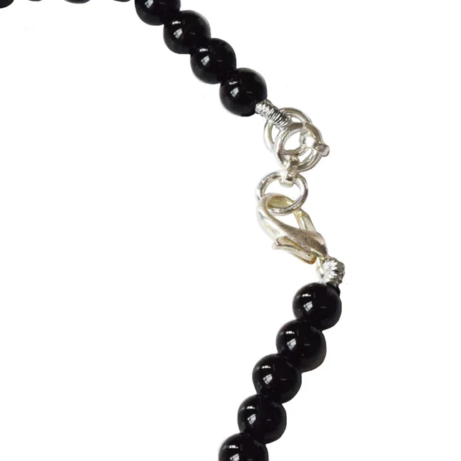 Mystic Charm: Black Onyx & Silver Om Pendant Bracelet for Her (SB84)