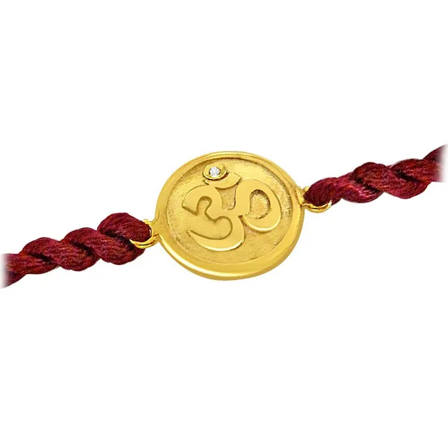 OM - Diamond and 18kt Yellow Gold Rakhi (SNDG1)