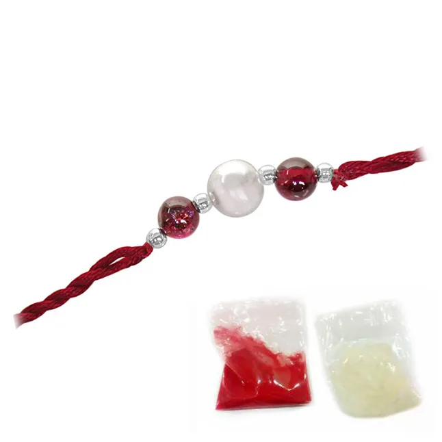 A Fine Real Freshwater  Pearl And Lustrous Garnet Rakhi (SNGP1)