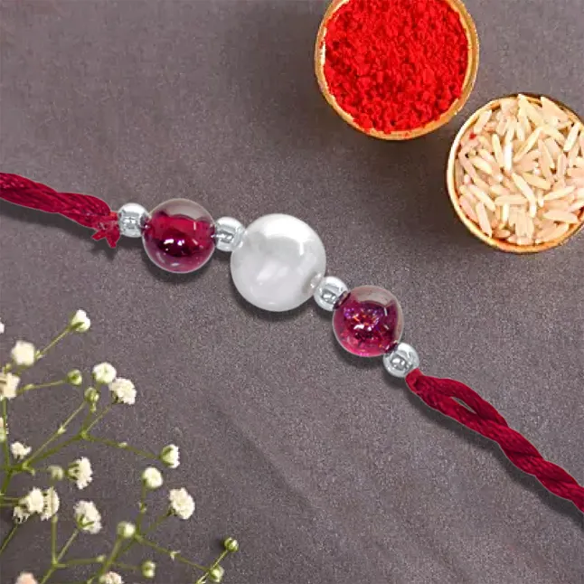 A Fine Real Freshwater  Pearl And Lustrous Garnet Rakhi (SNGP1)