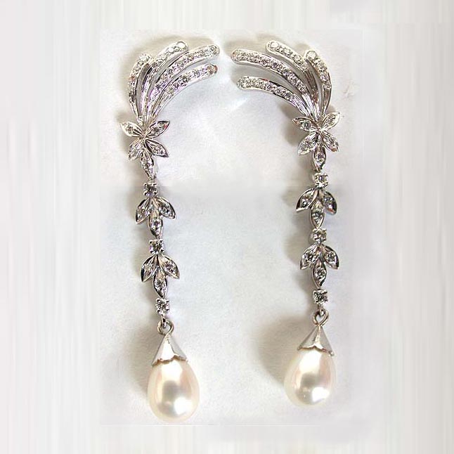 Bejeweling Brooks -0.62cts White I -VVS1 Diamond Earrings