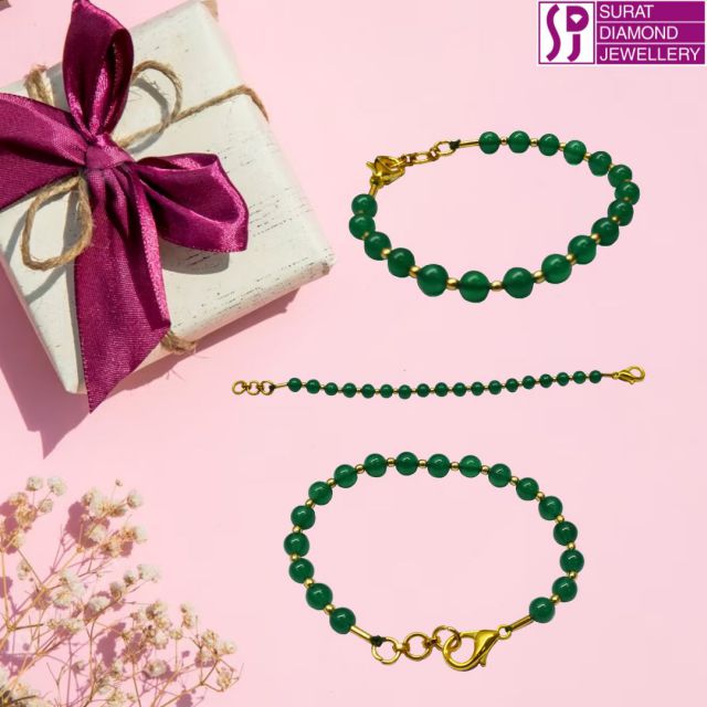 💚 Dive into Serenity with a Splash of Green Glam! 💚

Hey there, beautiful soul! 🌿 Ever felt the weight of the world on your shoulders? Let our Real Green Onyx and Gold Plated Beads Bracelet be your personal oasis. Known as the soothing stone, Green Onyx is here to whisk away your worries and wrap you in a cocoon of calm.

Not just a pretty face, this gem is a symbol of purity and serenity. Paired with gold-plated beads, it's the perfect blend of elegance and tranquility. Whether you're navigating the urban jungle or just lounging at home, let this bracelet be your constant companion.

🌟 Feeling the vibe? Embrace the calm, embrace the glam. CLICK TO SPARKLE! 

Click on : https://www.suratdiamond.com/bangles/green-onyx-beads-bracelet-sb65.aspx